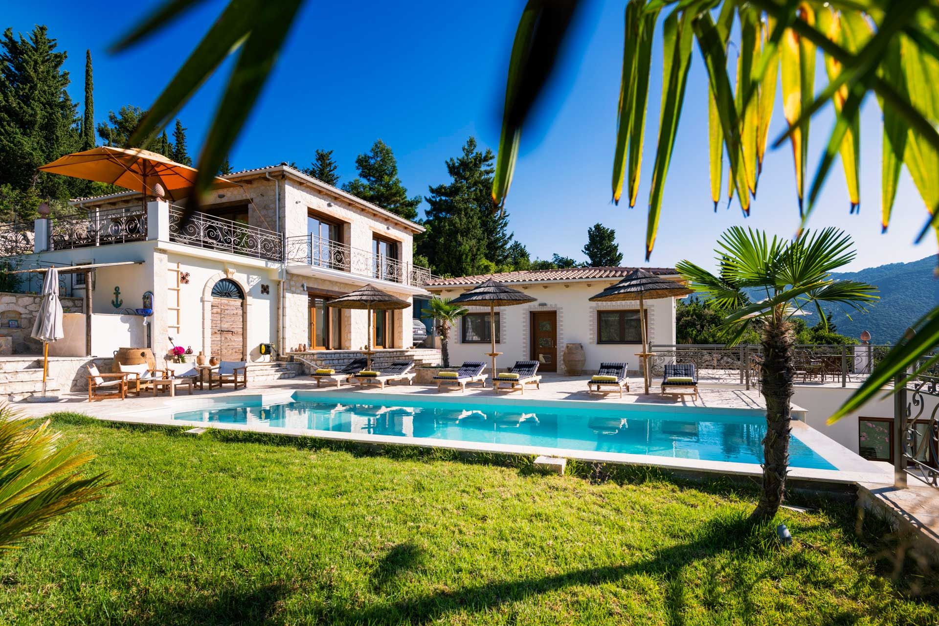 Sample photo: a private stone villa with its own pool and lawn